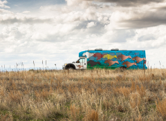 Image of the Rolling Rez Arts in a field