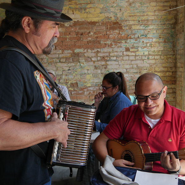 Local musicians playing accordion 